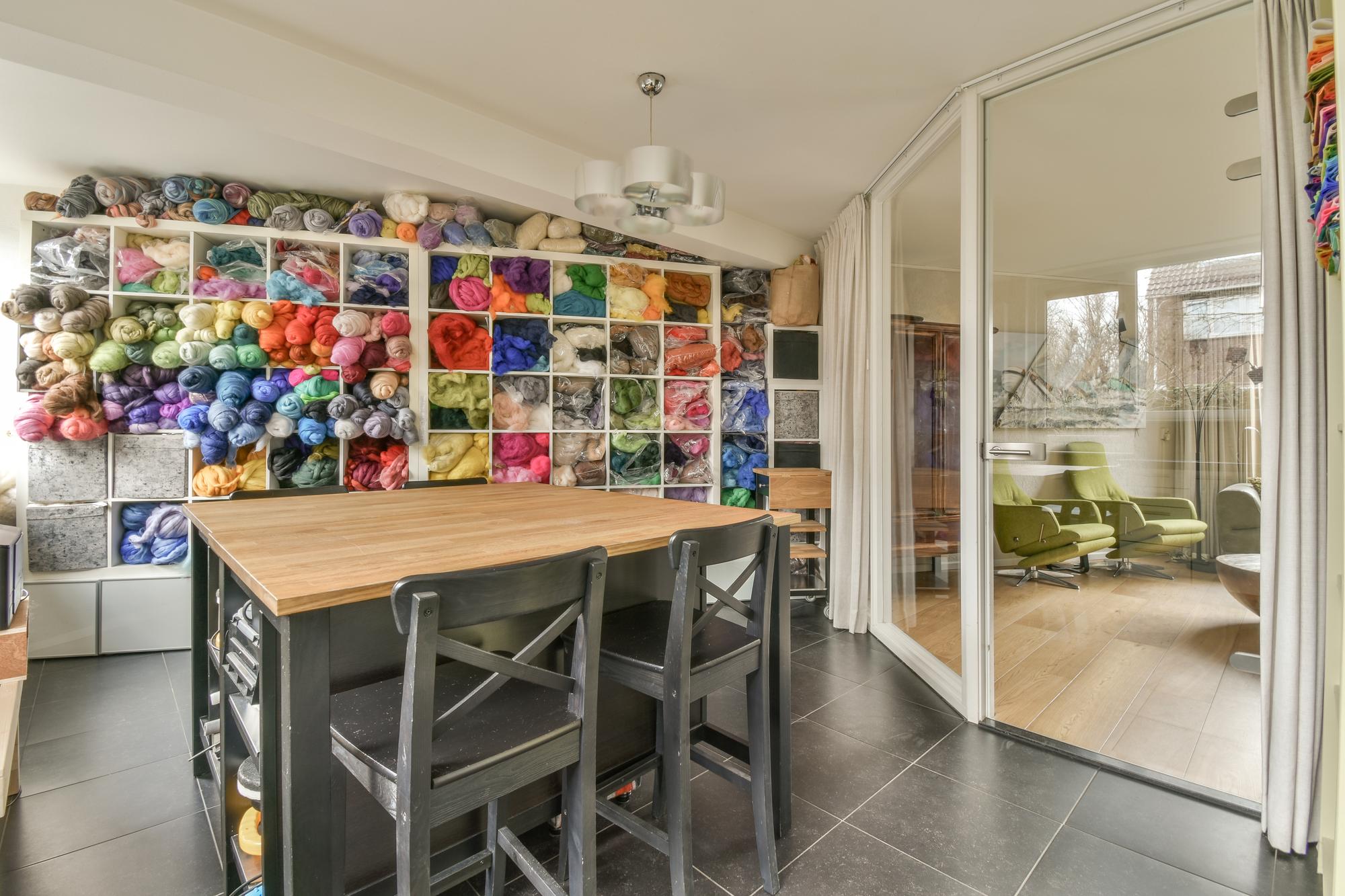 Interior of embroidery studio with finished pieces