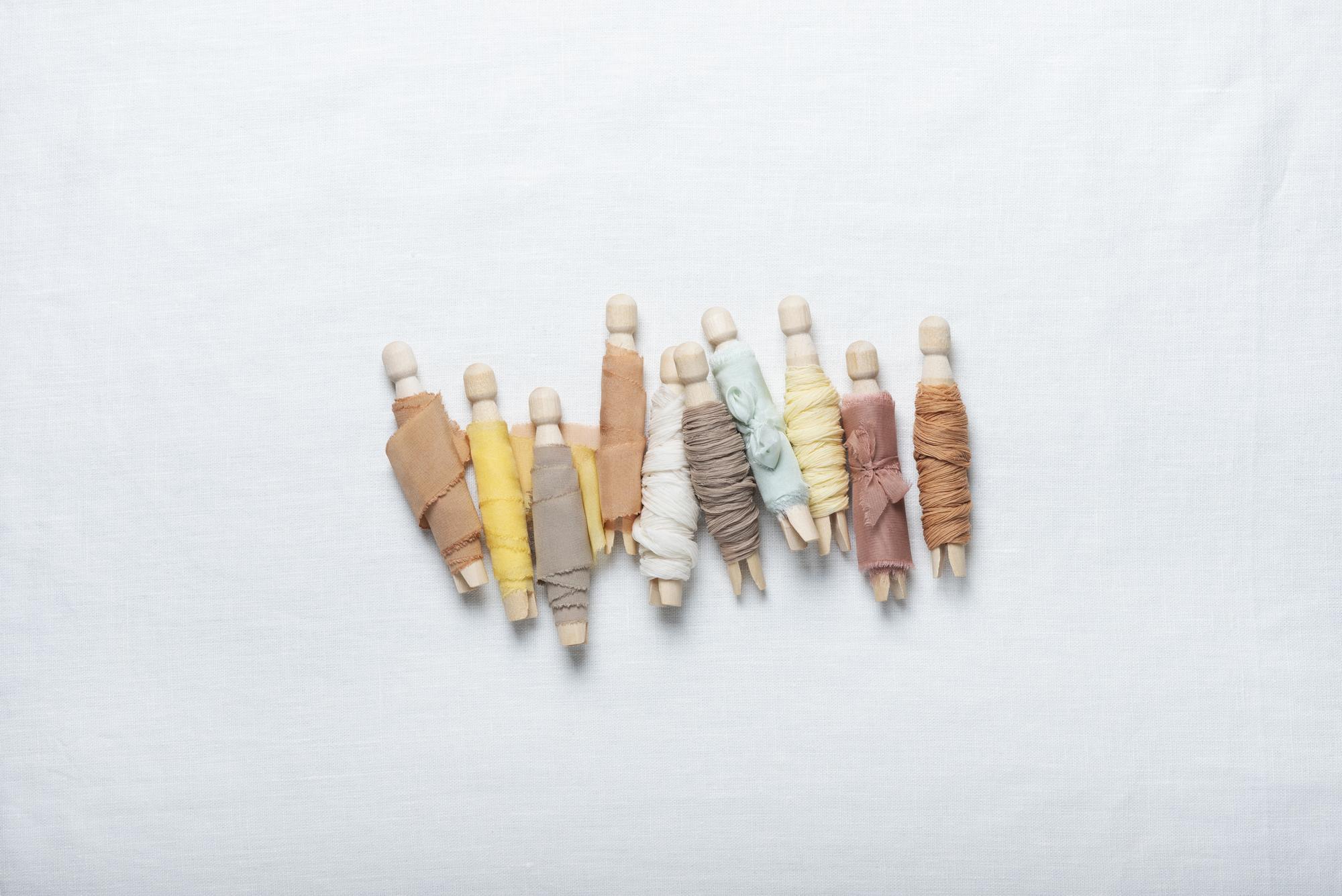 Array of thread spools and swatches